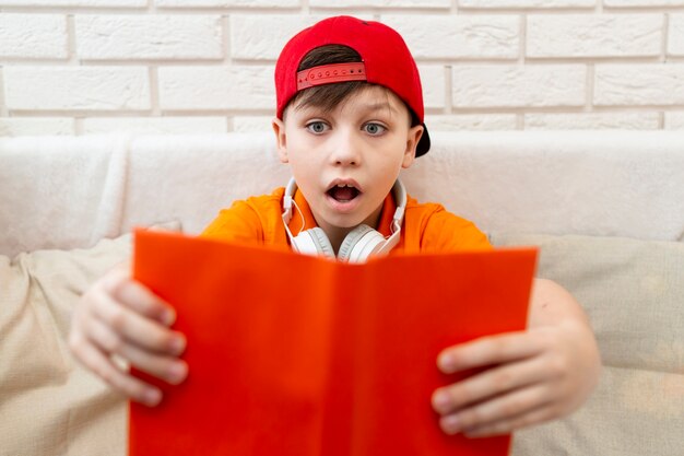 High angle young boy reading