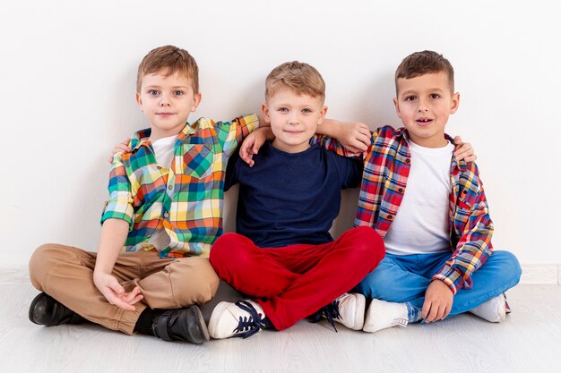 High angle young boys at book day