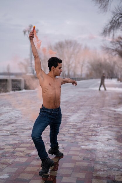 High angle young man performing ballet