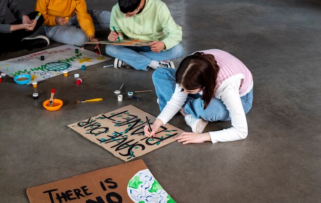 High angle young people sitting together