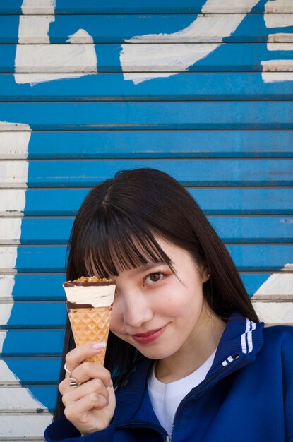 High angle young woman holding ice cream