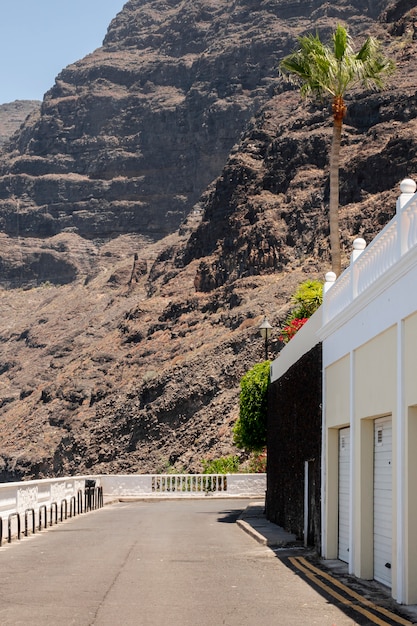 High cliff with white building