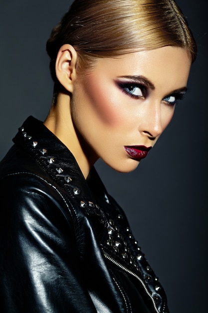 High fashion look.glamor closeup portrait of beautiful sexy stylish Caucasian young woman model with bright modern makeup, with dark red lips,  with perfect clean skin