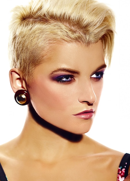 High fashion look.glamor closeup portrait of beautiful sexy stylish Caucasian young woman model with bright modern makeup with short hair\