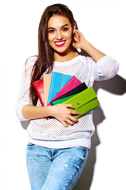 Free photo high fashion look.glamor stylish sexy smiling beautiful young woman model in summer bright white casual  hipster cloth with colorful clutch  purse