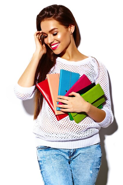 High fashion look.glamor stylish sexy smiling beautiful young woman model in summer bright white casual  hipster cloth with colorful clutch  purse