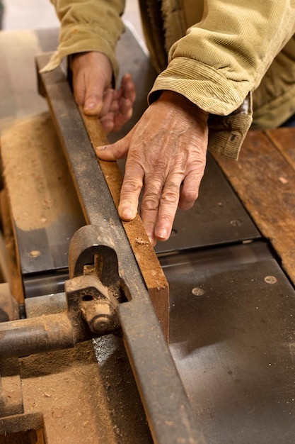 High view carpenter working with wood