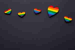 Free photo high view copy space black background and pride hearts