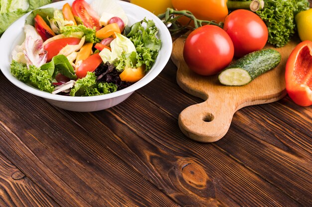 High view delicious fresh food on wooden background