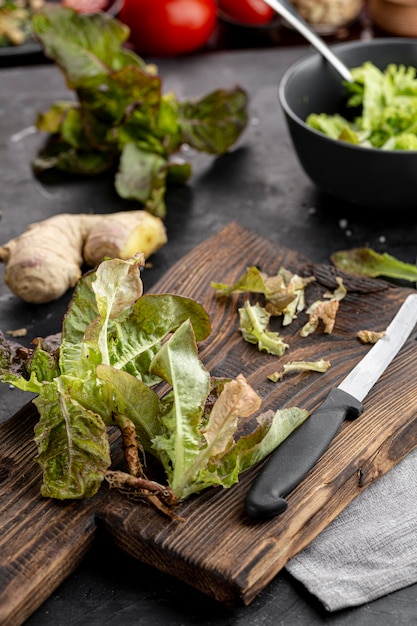 High view green salad on wooden board