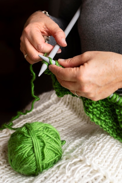 Free photo high view green thread for knitting