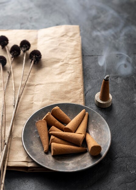 High view incense aromatic cones and dried flowers