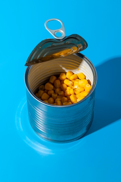 Free photo high view open tin can filled with corn