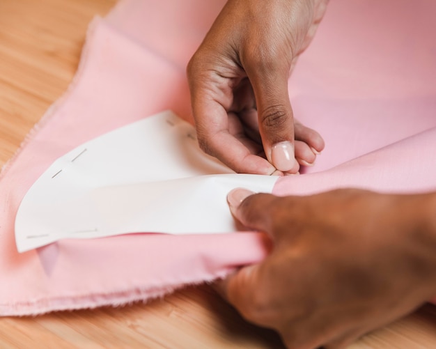 High view person sewing a pocket