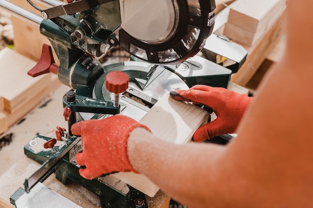 Free photo high view person working in carpentry