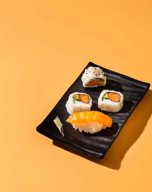 High view sushi rolls with nigiri