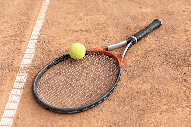 High view tennis ball with racket