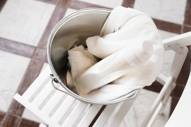 High view white towels in laundry basket