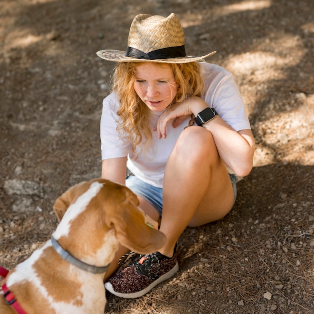 High view woman and her dog