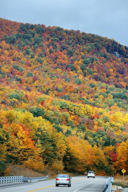 Highway and Autumn foliage in White Mountain, New Hampshire.