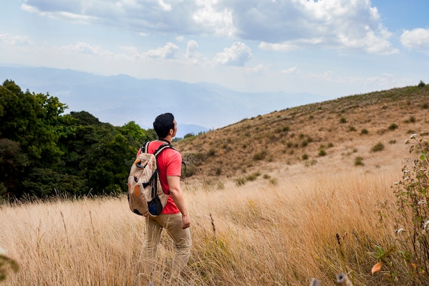 Hiker looking at fields