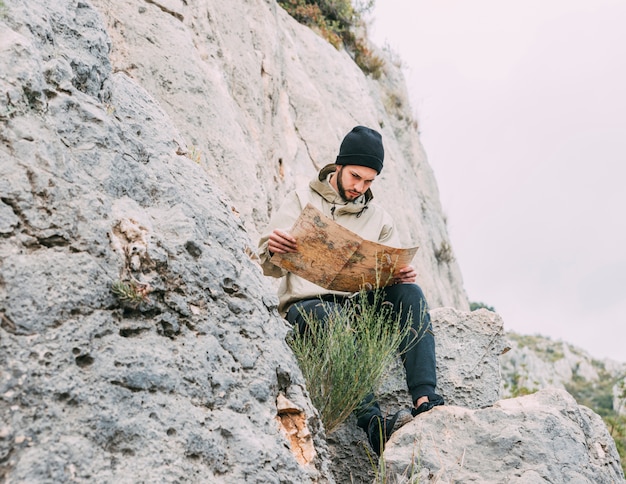 Hiker looking at map