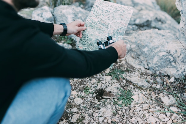 Hiker looking at map