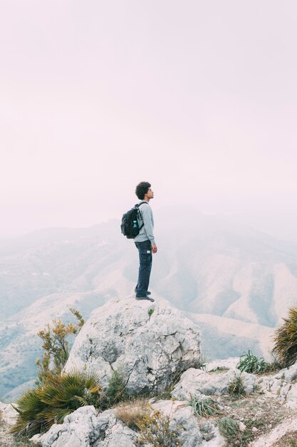 Hiker standing on rock