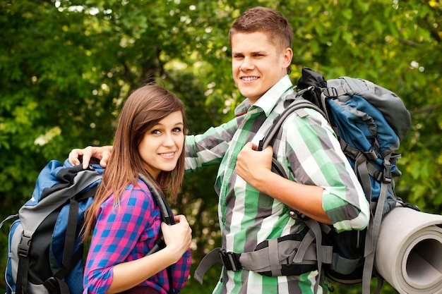 Free photo hikers in forest