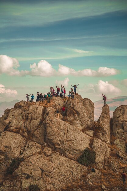 Free Photo hikers on a rock