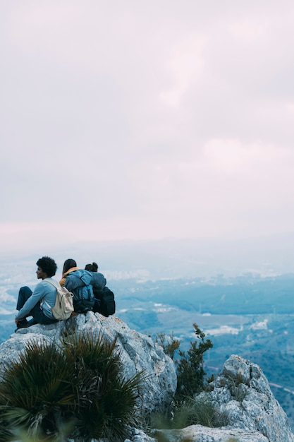 Hikers sitting on rock