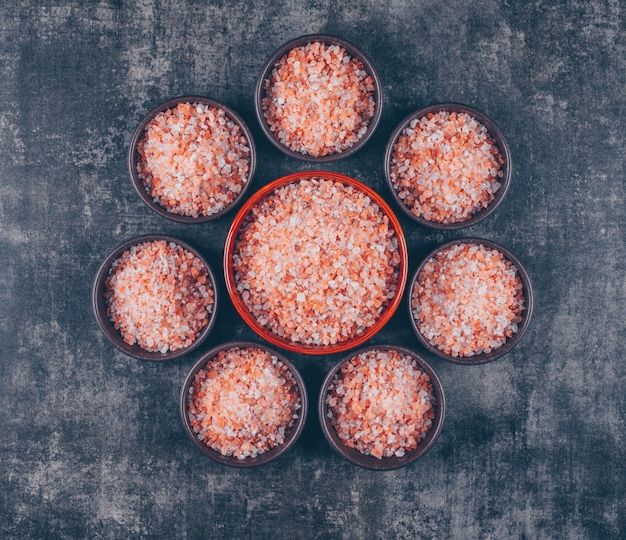 Free photo himalayan salt in bowls forming flower shape