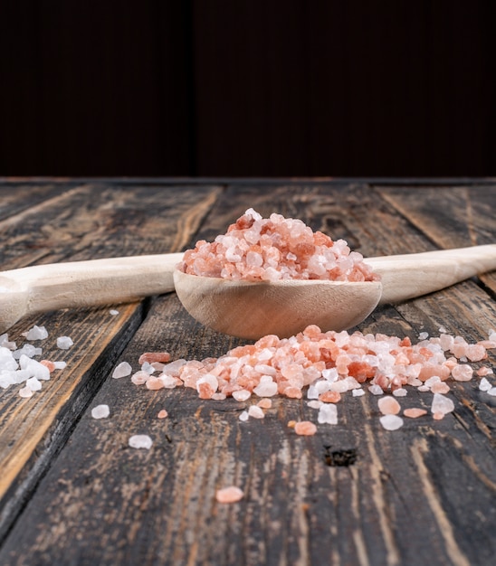 Himalayan salt in a wooden spoon