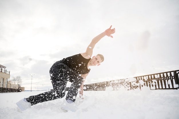 Hip hop dancer outside with snow