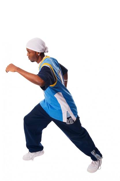 Free photo hip-hop young man making cool move on white background