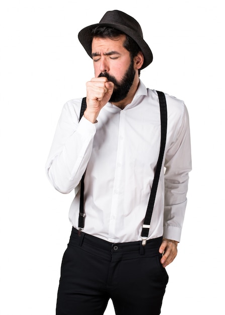 Hipster man with beard coughing a lot
