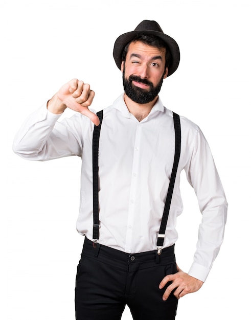 Hipster man with beard making bad signal