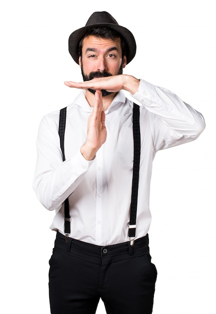 Free photo hipster man with beard making time out gesture