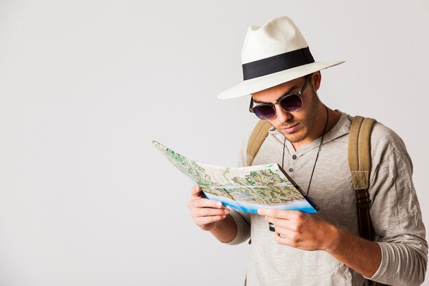 Hipster man with map