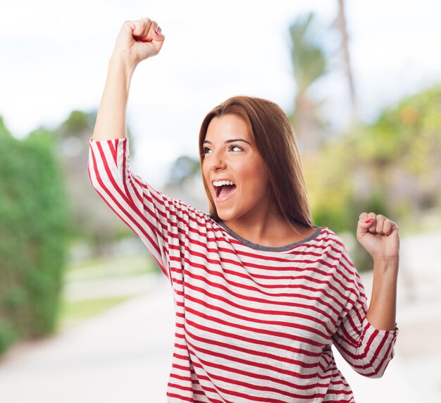 hispanic young female laughing arms