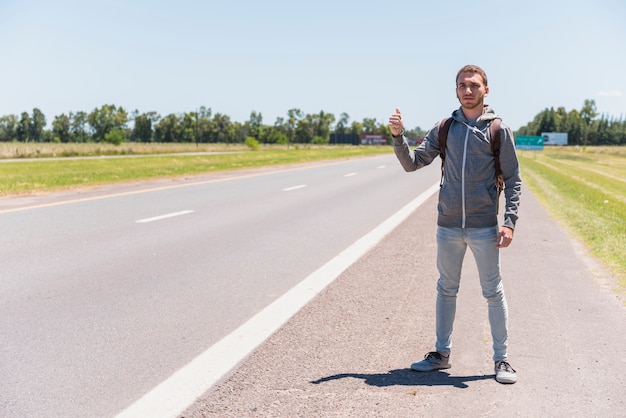 Hitchhiking boy