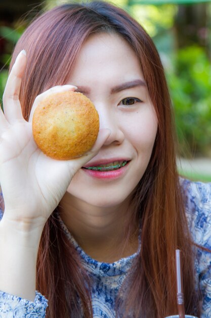 Free photo holding banana cake