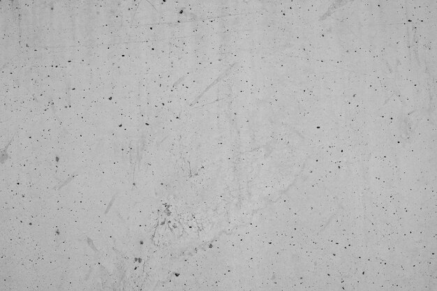 Отверстия и царапины на бетонной стене