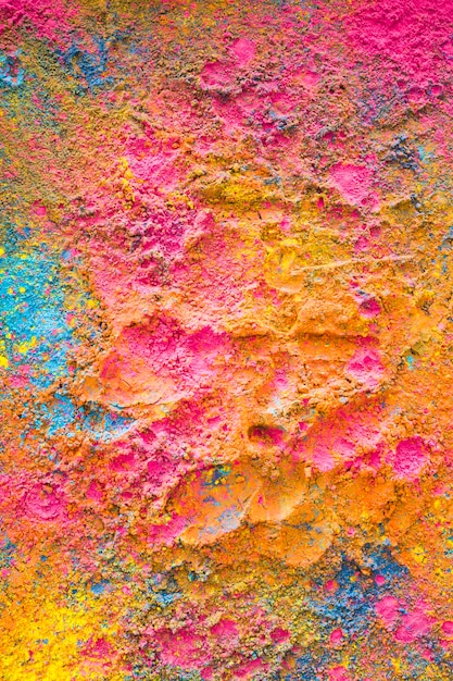Holi colors randomly scattered on surface