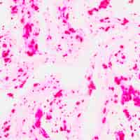 Foto gratuita polvere di colore rosa holi mescolato con fondo astratto strutturato liquido