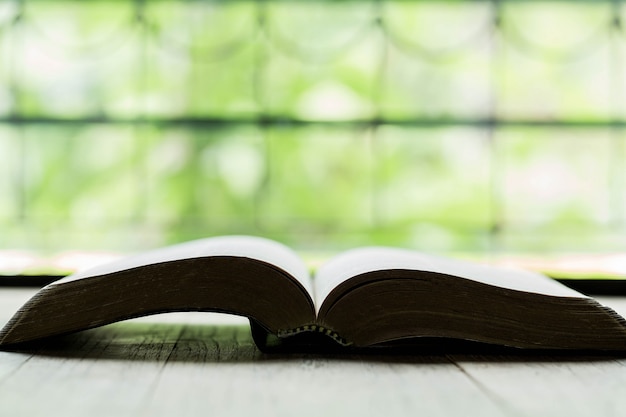 Holy Bible on a wooden table