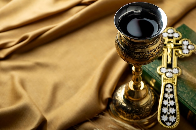 Free photo holy communion with holy grail with wine