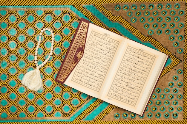 Holy mat with book and bracelet