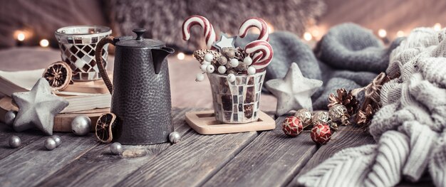 home comfort, details of the festive interior on a wooden table