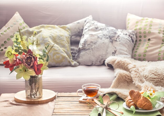 Homely cozy spring interior in the living room